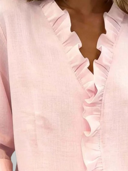 Amoura | Blouse à volants, col en V et manches longues