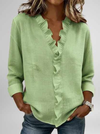 Amoura | Blouse à volants, col en V et manches longues