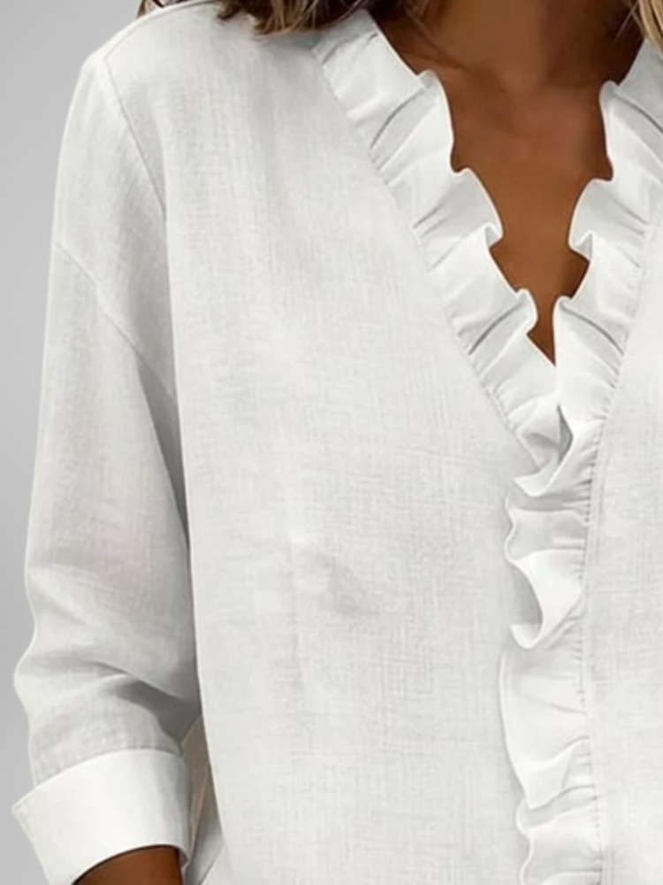 Amoura | Blouse à volants, col en V et manches longues